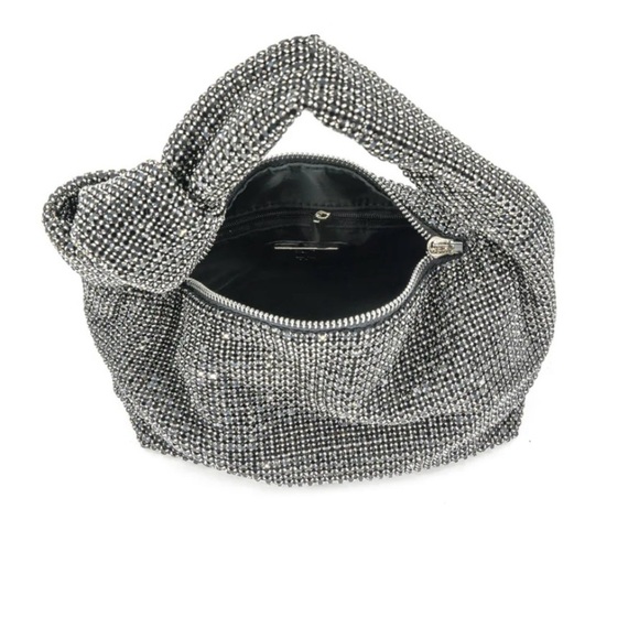 Elegant Silver Ringtones Evening Wristlet. Everything is new fits any 📱.